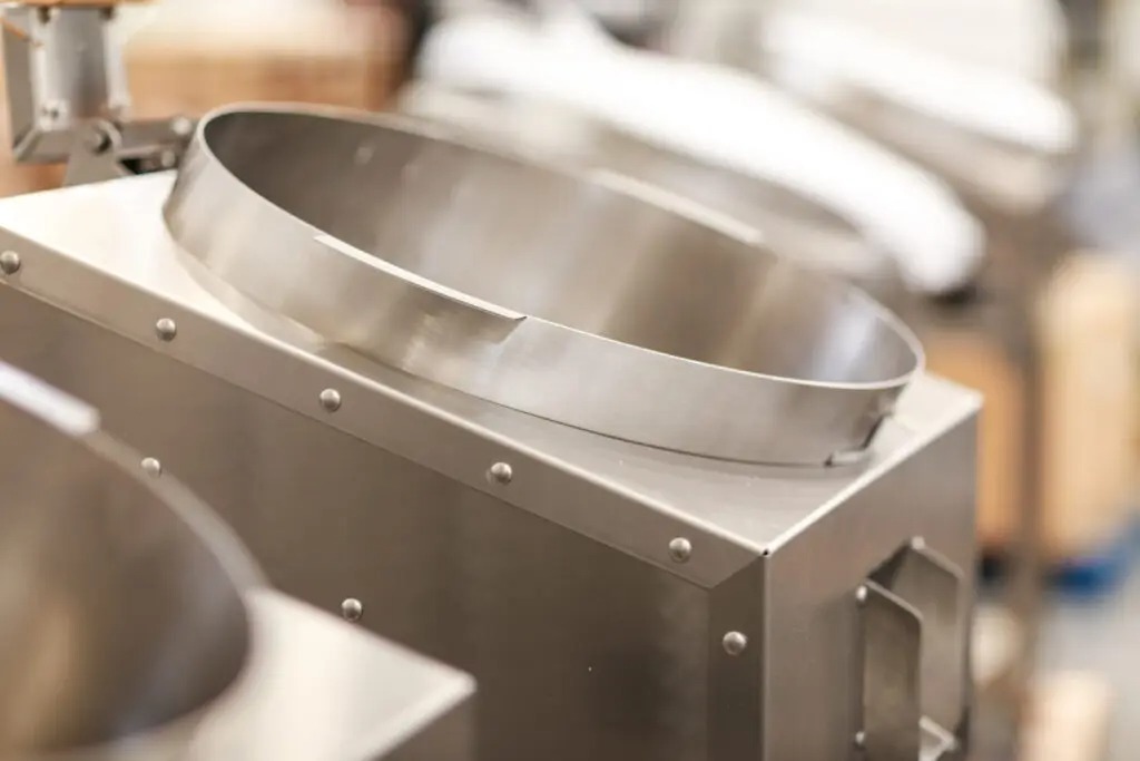 Rolled stainless steel vessel body with a polished sanitary finish ready for welding